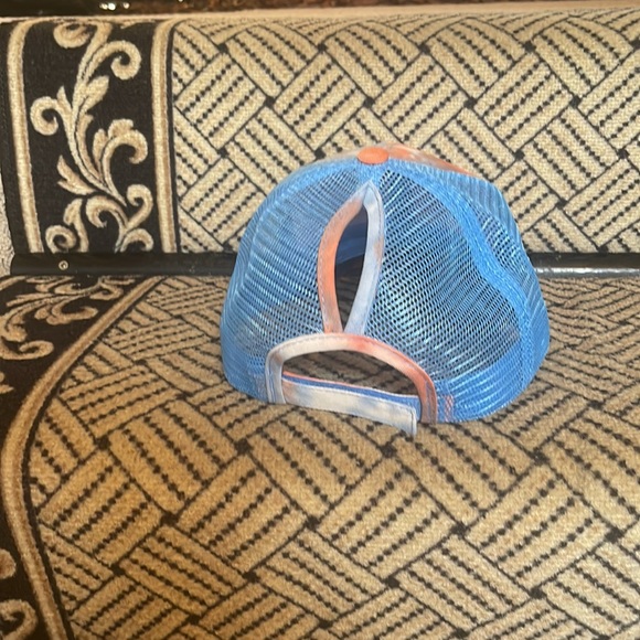 Trucker hat, with ponytail eyelet, adjustable snap back. - Picture 3 of 4